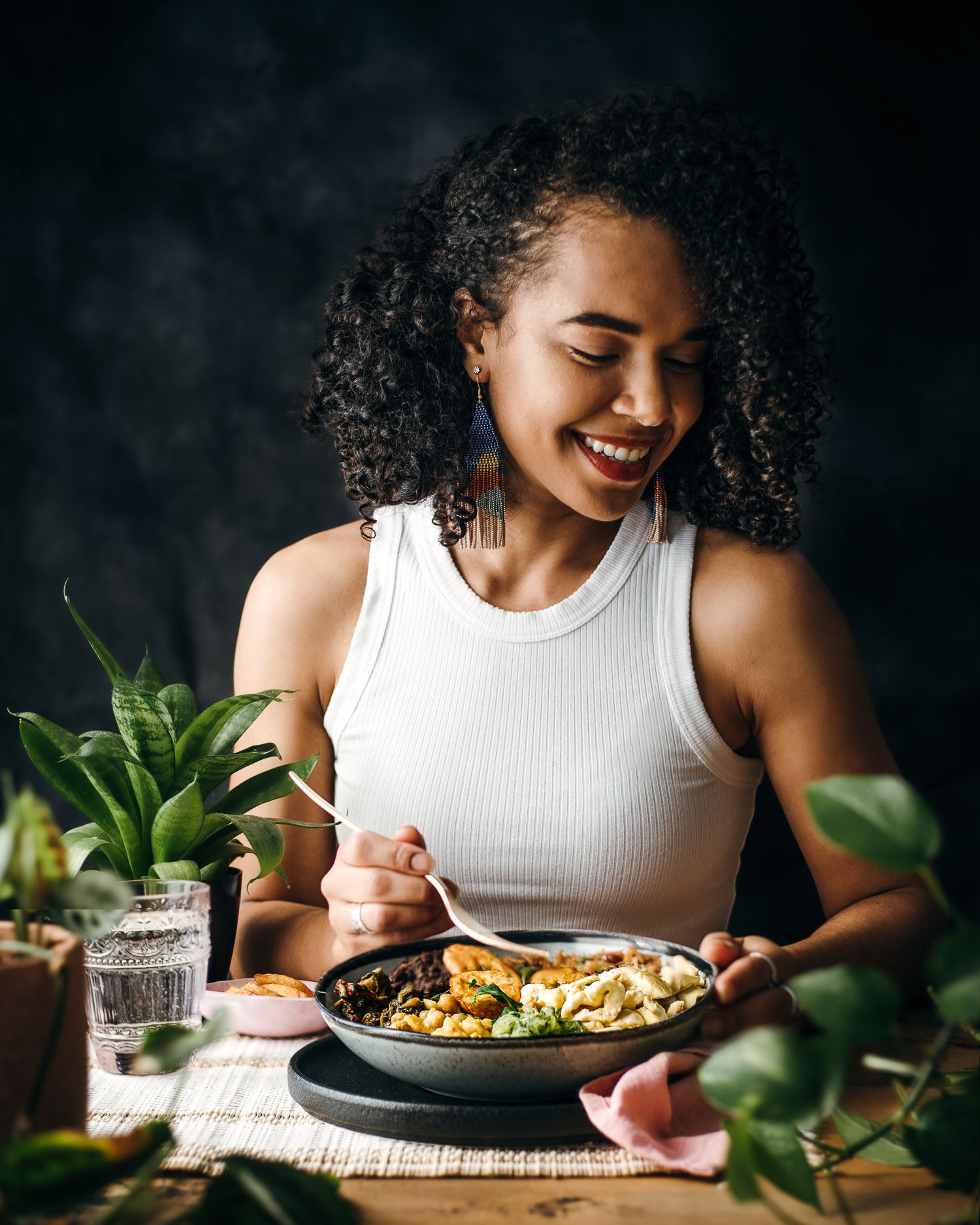 girl eating afro inspired vegan food