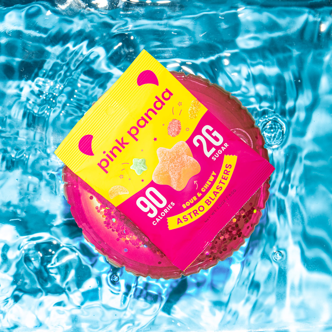 Candy pack floating on inflatable donut over water