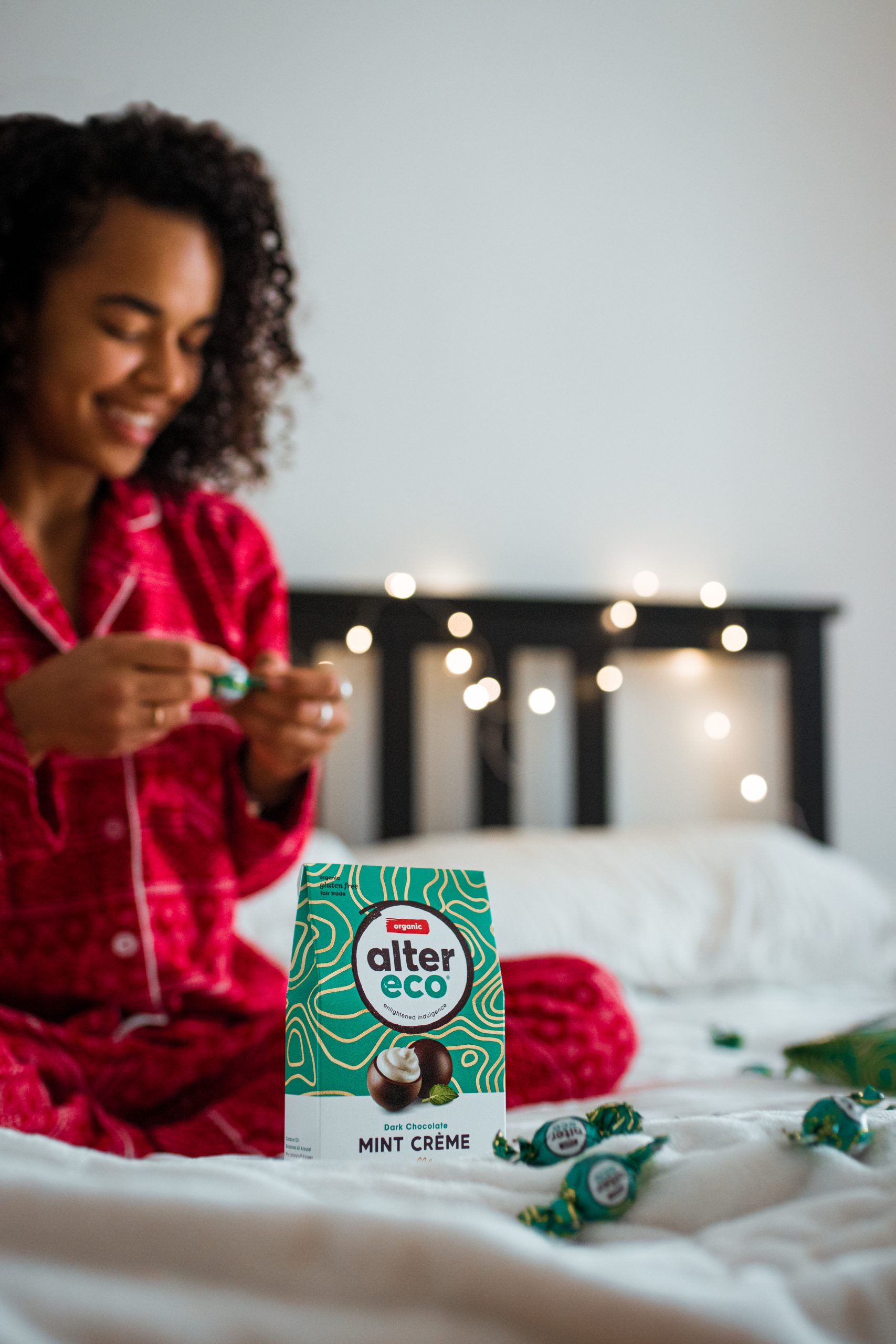 Girl in pyjama on a bed