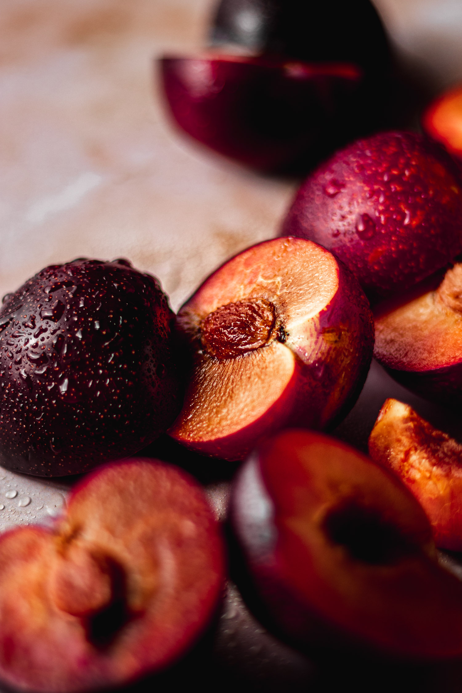 Fresh plums drizzled with water