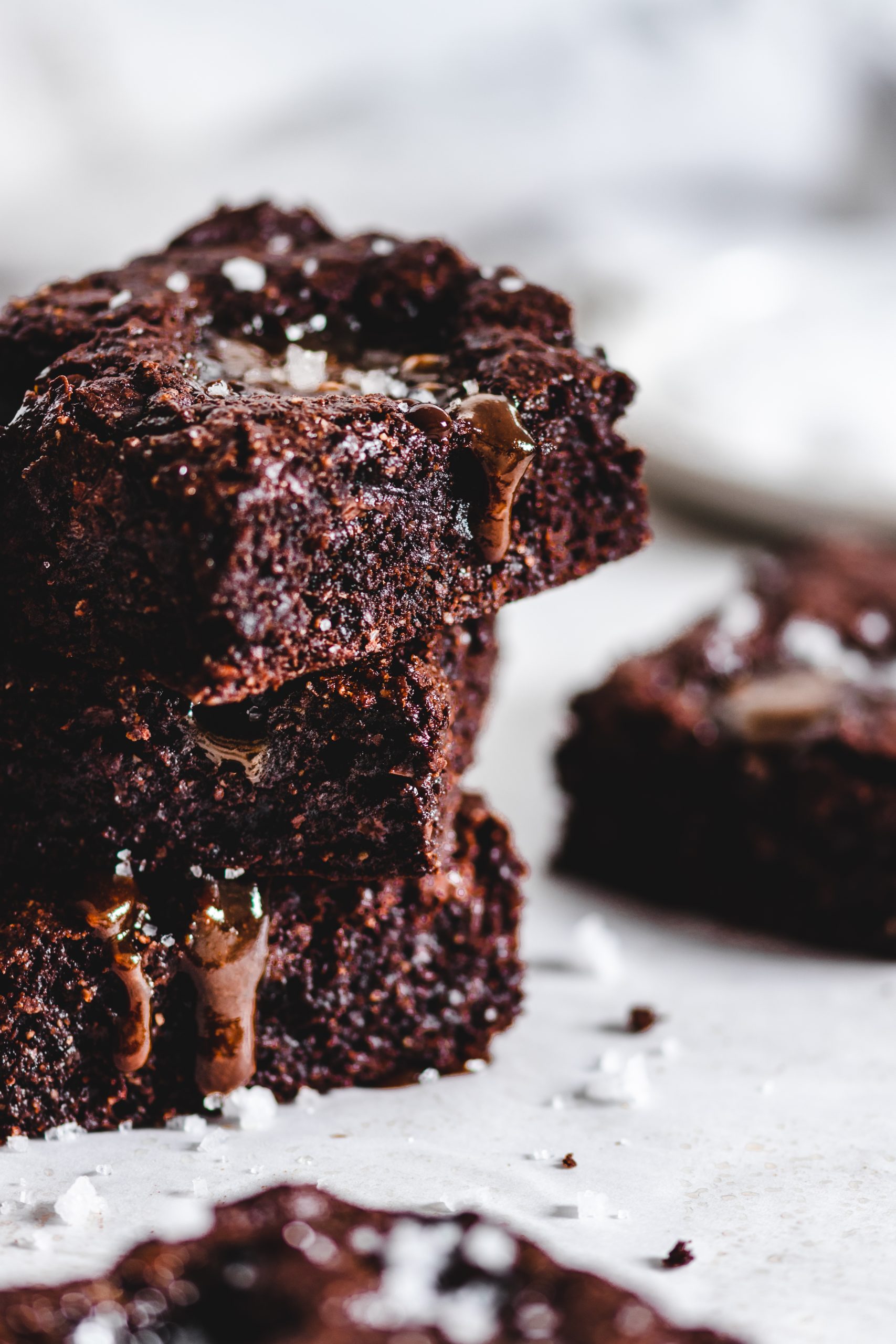 Salted caramel brownies with melted caramel dripping down the side