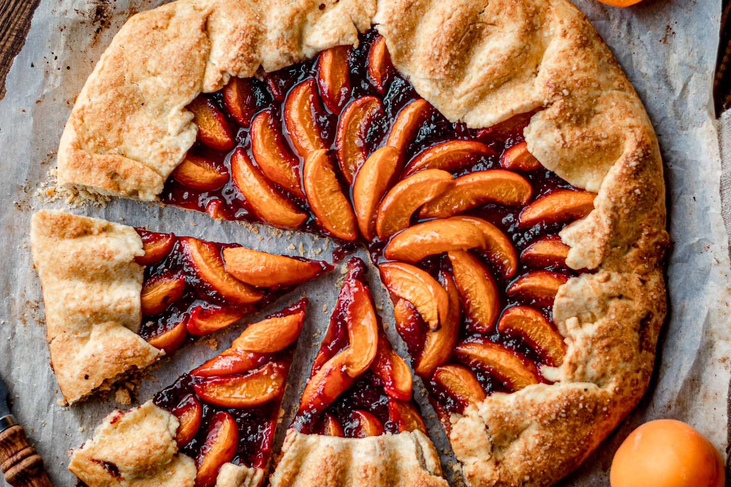 Overhead of Apricot Cherry galette with 3 slices cut out.