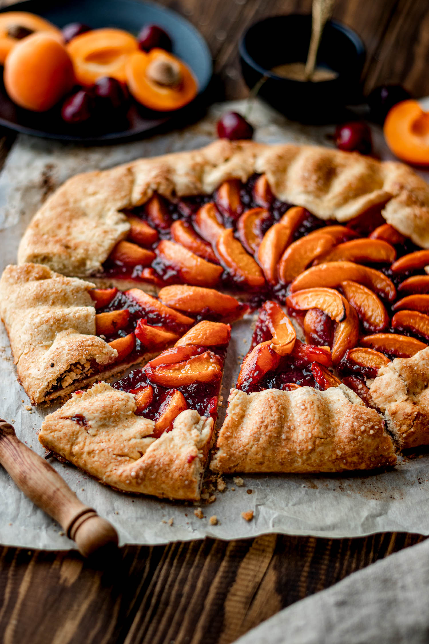Apricot Cherry galette with 3 slices cut out.