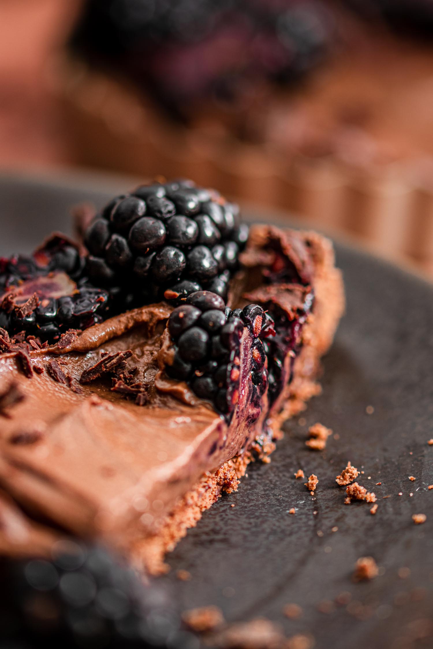 Tart cut in half with juicy blackberry in the middle.
