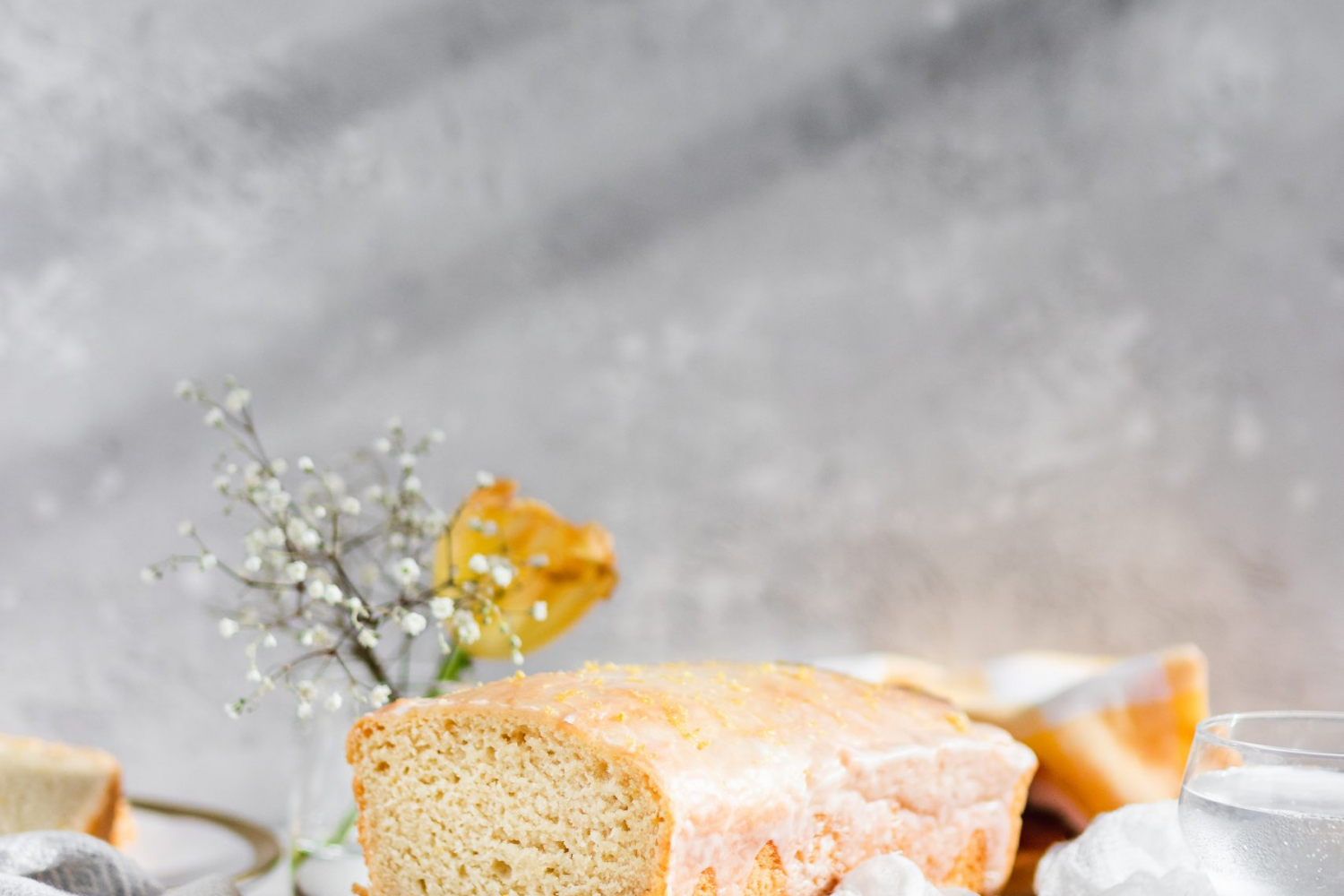 Loaf of lemon pound cake with slice cut off