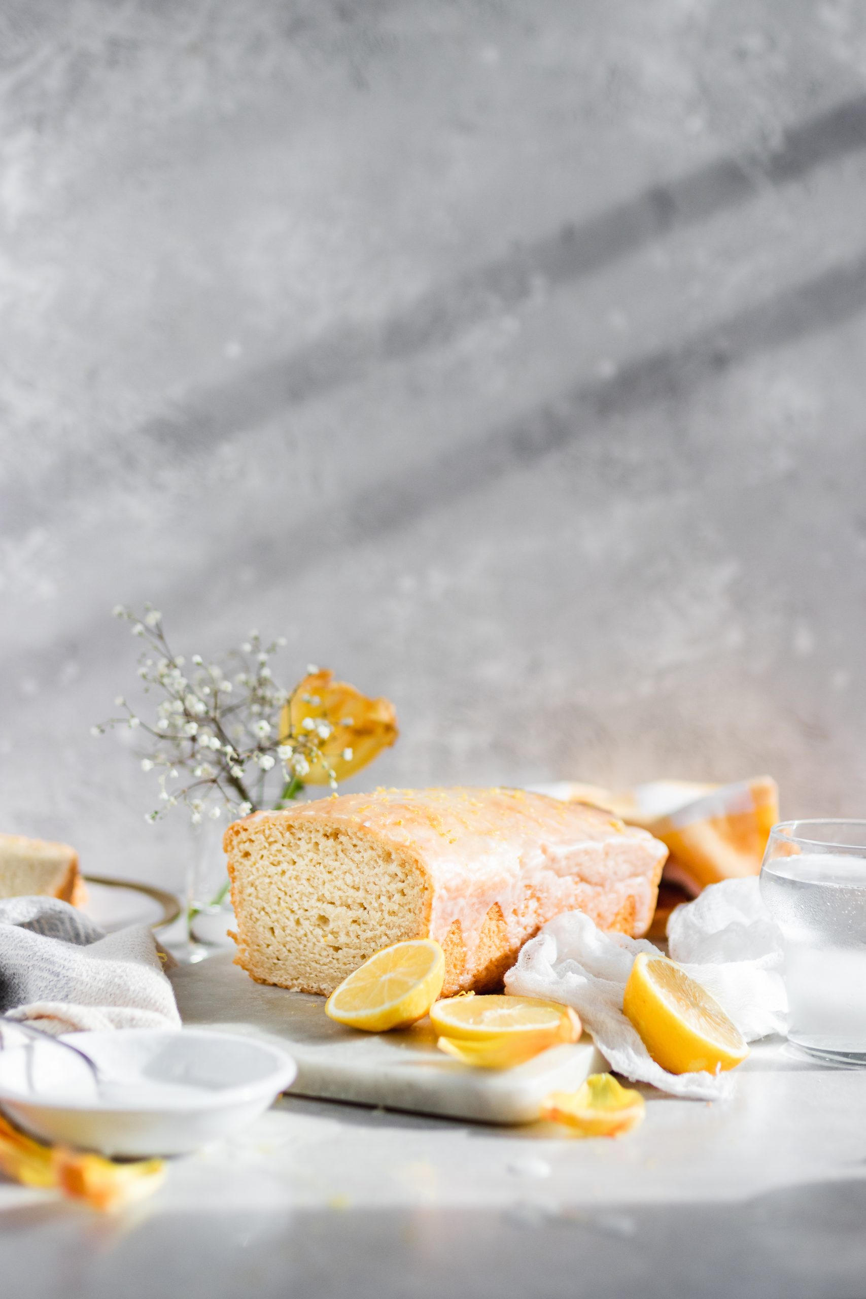 Loaf of lemon pound cake with slice cut off