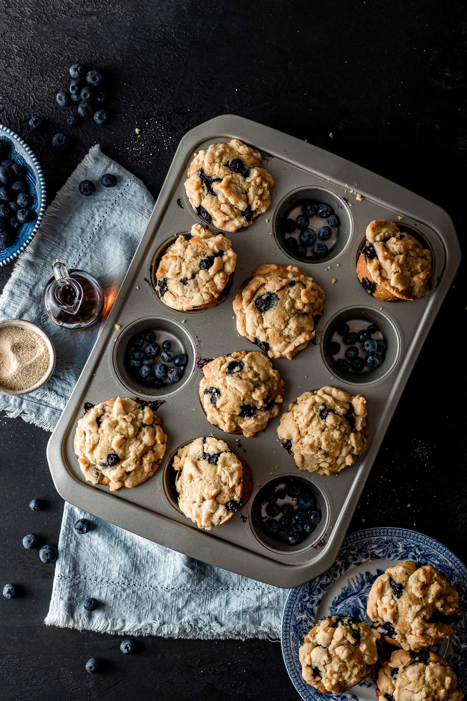 Overhead shot of blueberry muffins in a muffin pan.