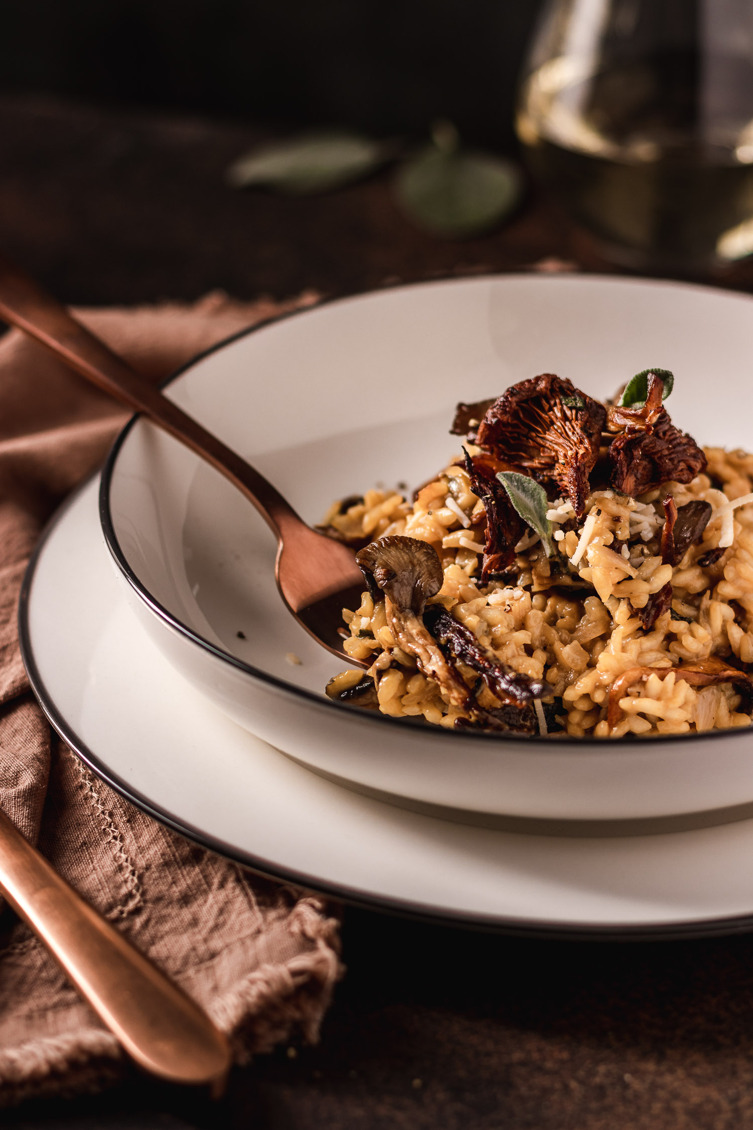 Close up of fork in a plate of risotto.