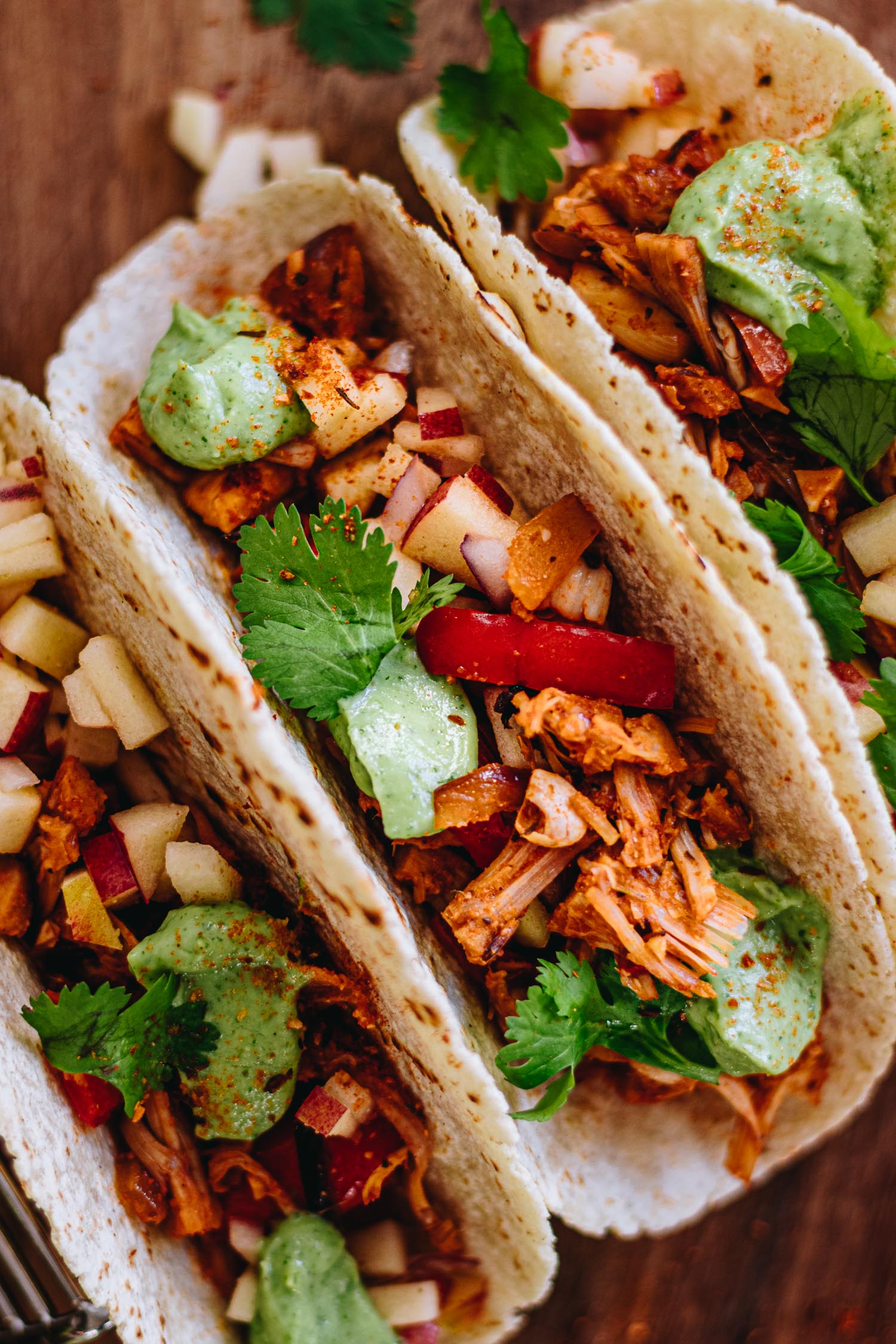 Close up of taco filling, made with jackfruit and apple-cumin salsa