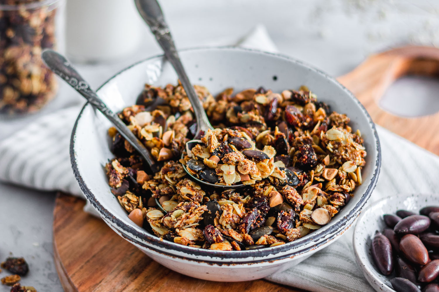 Nut free granola in a bowl with two spoons