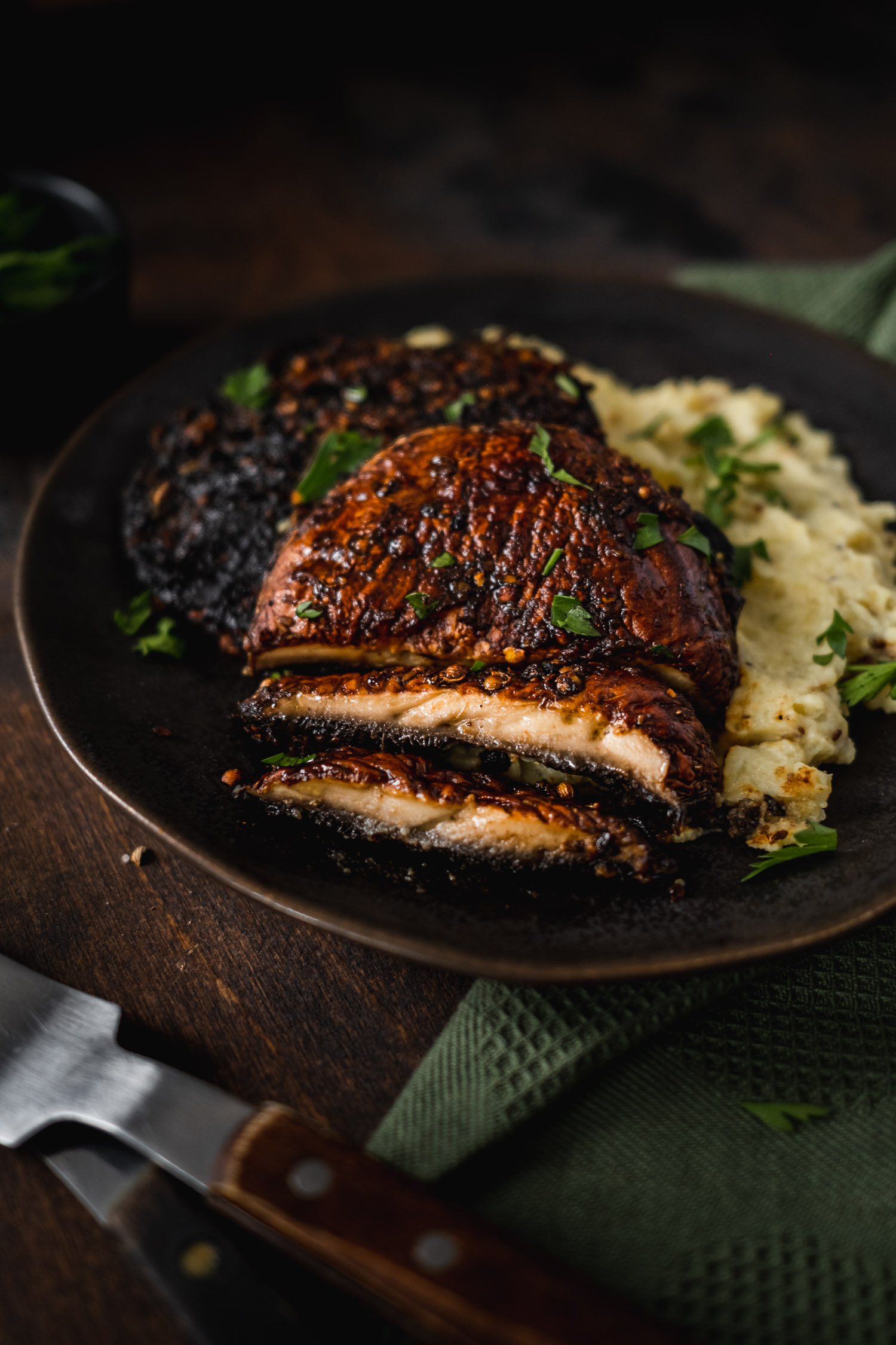 Closeup of portobello cut into slices.