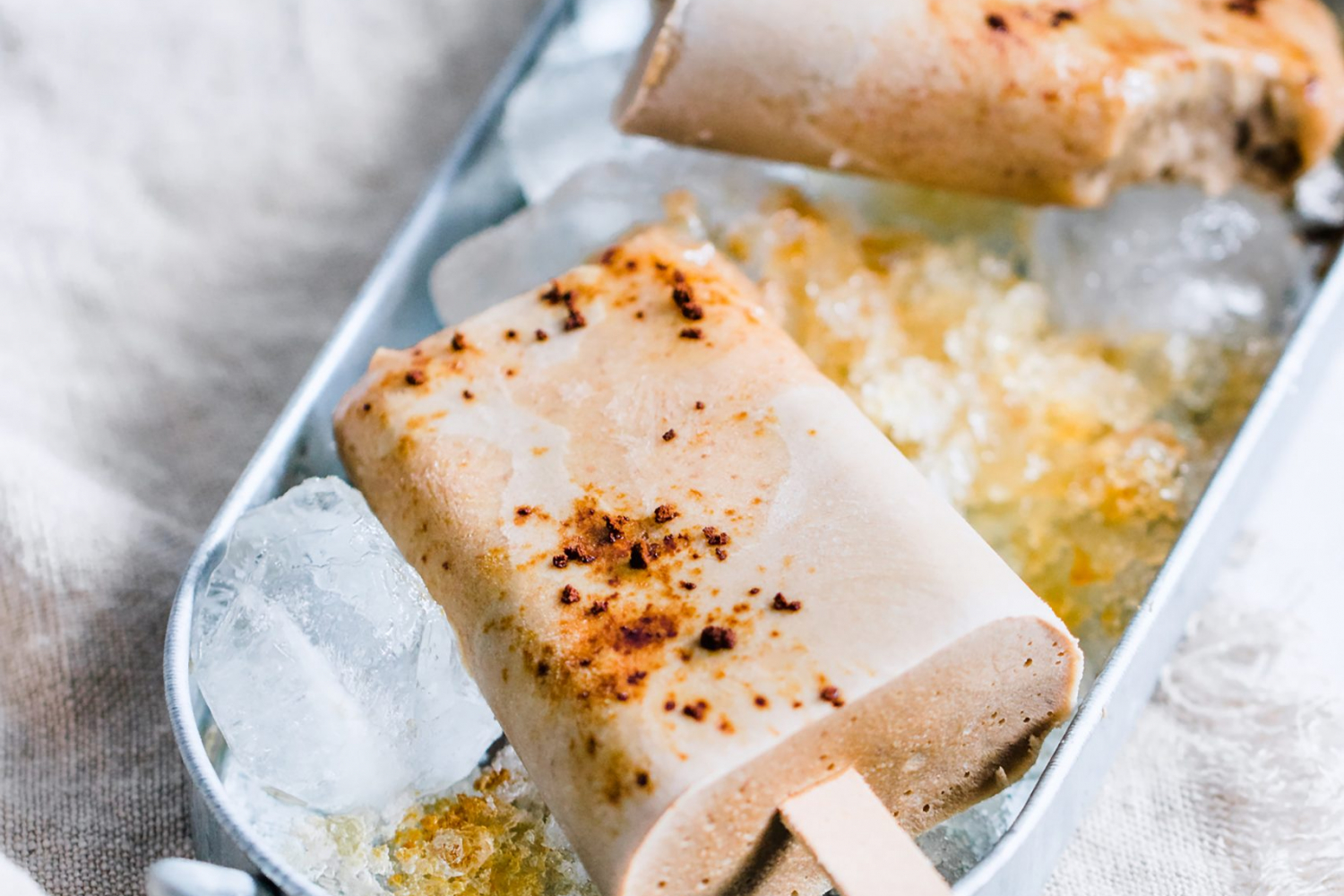 Salted Caramel Latte Pops in a tray with ice