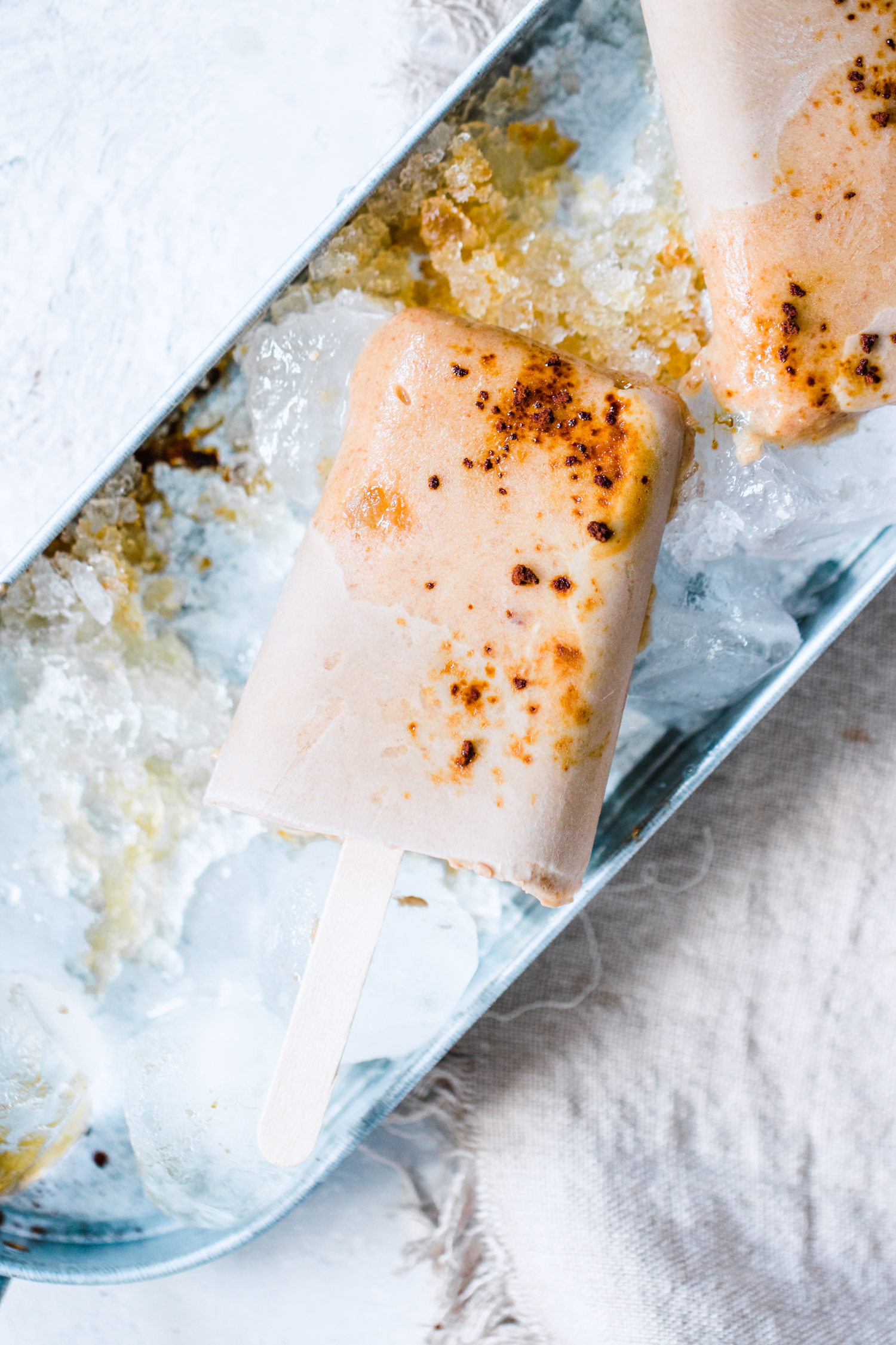 Salted Caramel Latte Pops in a tray with ice