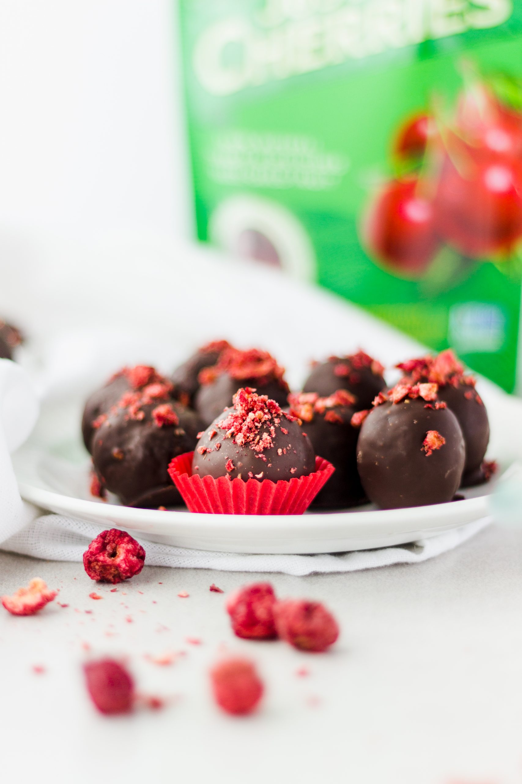 Chocolate Covered Cherry Cashew Truffles with Karen's Naturals Bags in the background