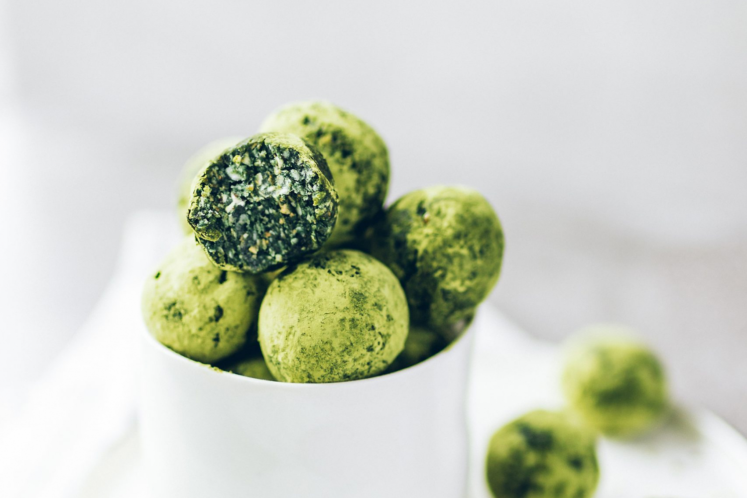 Spirulina Hemp and Coconut Bliss Balls in a little jar