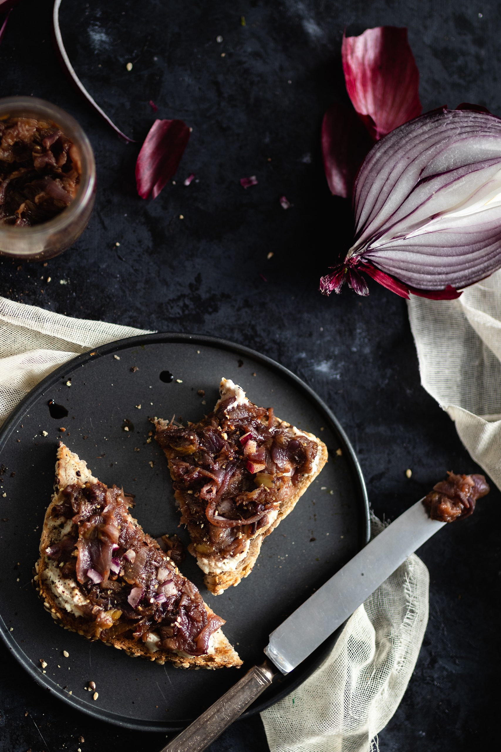 Onion jam on a toast with vegan cream cheese