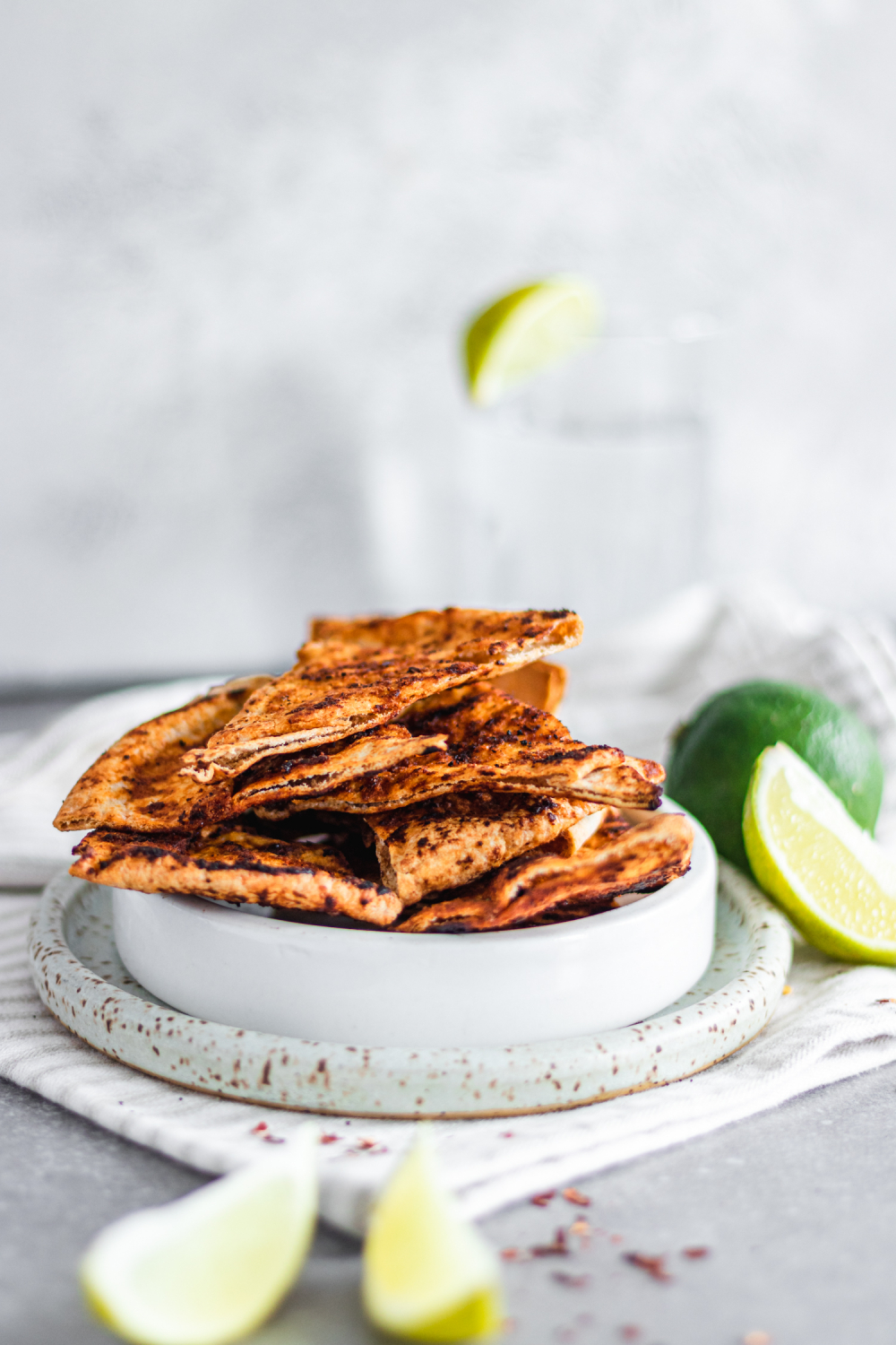 Stack of Whole Wheat Chili and Lime Pita Chips on a plate