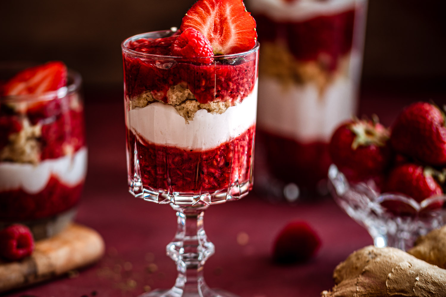 Spicy Berry Trifle topped with fresh strawberry