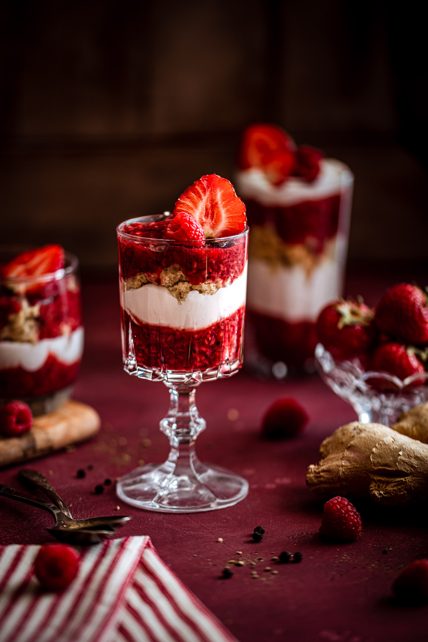 Spicy Berry Trifle topped with fresh strawberry