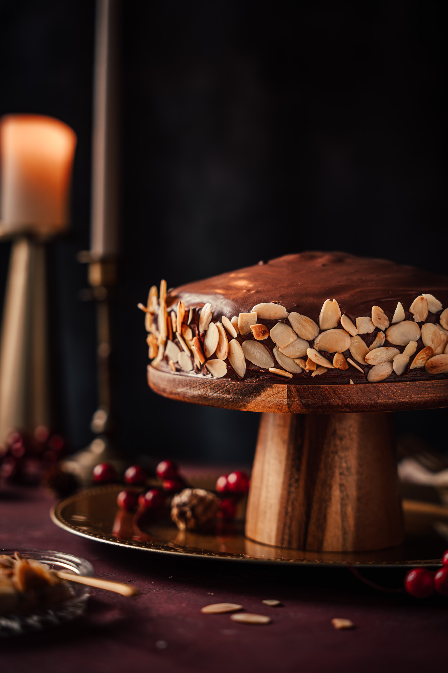 Spiced Sachertorte Cake on a wooden stand