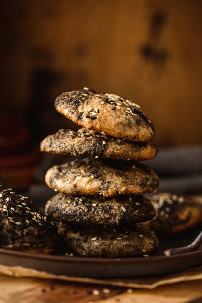 Stacked Orange Blossom Sesame Cookies on a plate