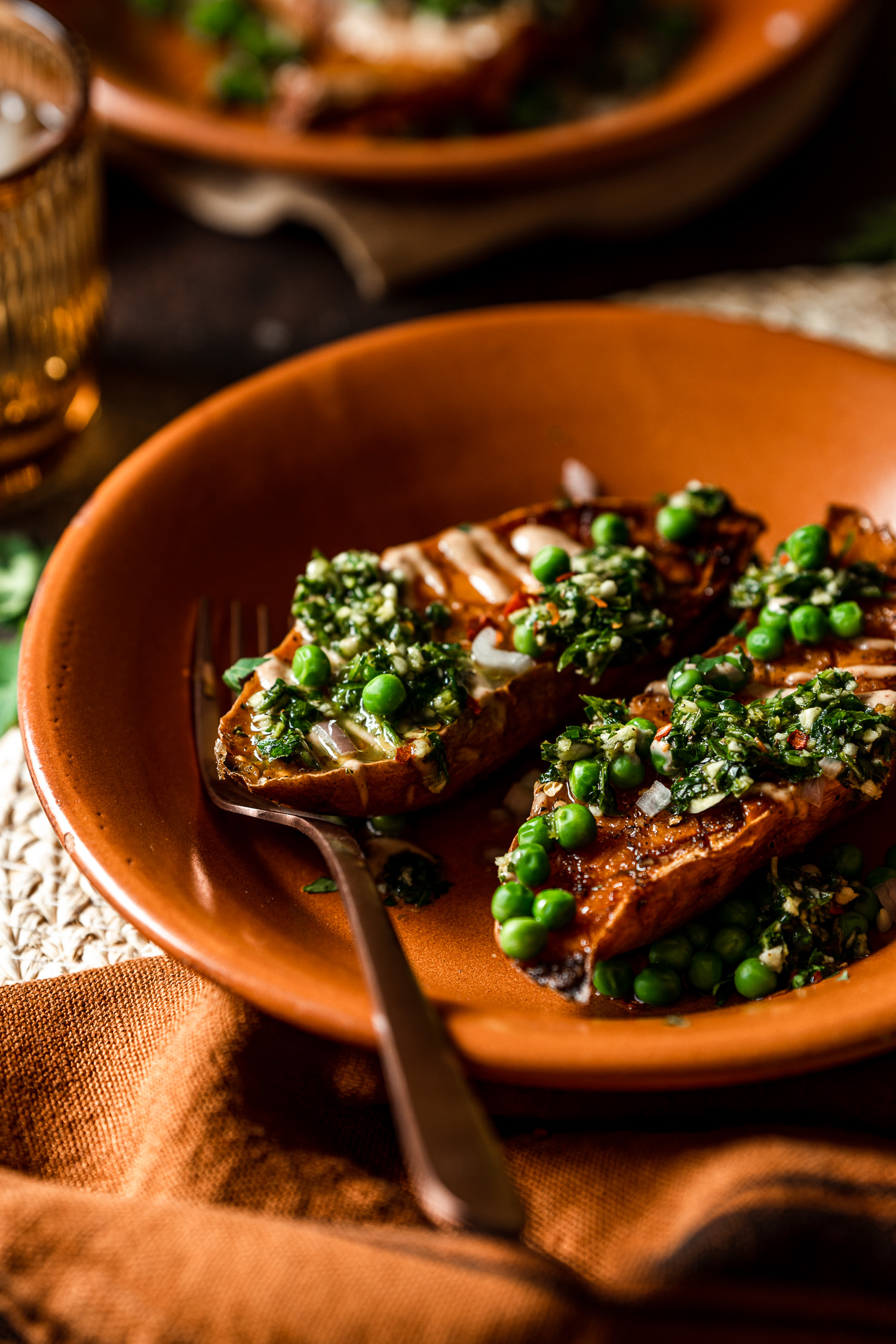 Close up of Roasted Sweet Potato Boats with Spicy Chimichurri and Smoky Crema