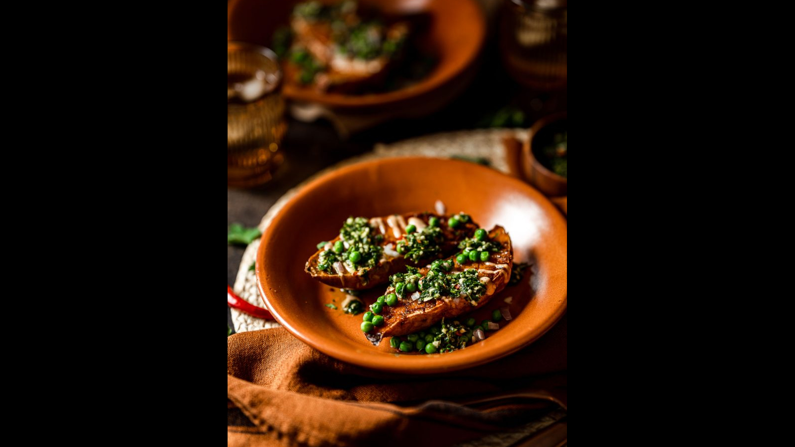 Roasted Sweet Potato Boats with Spicy Chimichurri and Smoky Crema | Murielle Banackissa