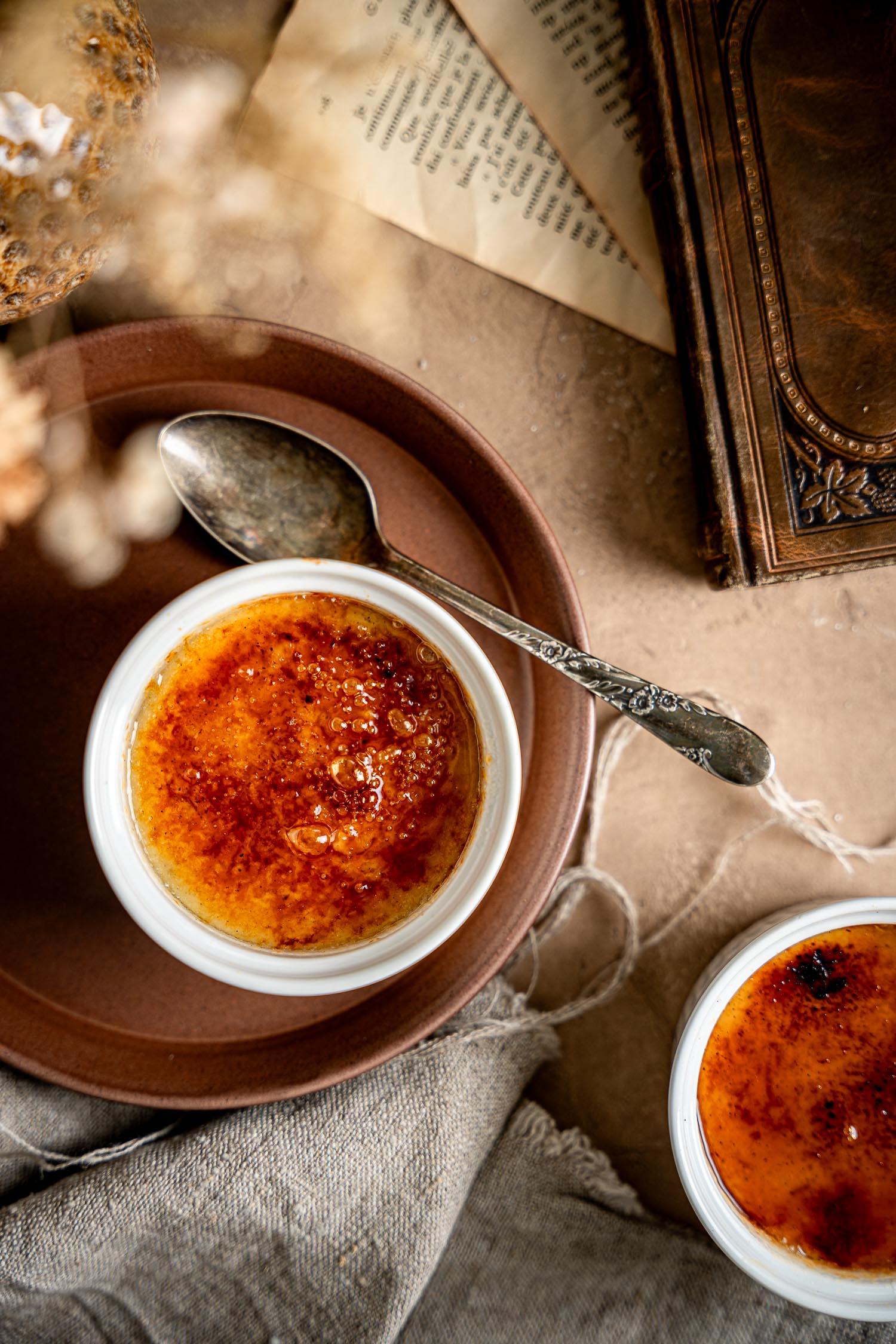 Two Vegan Vanilla-Cardamom Crème Brûlée ready to be eaten