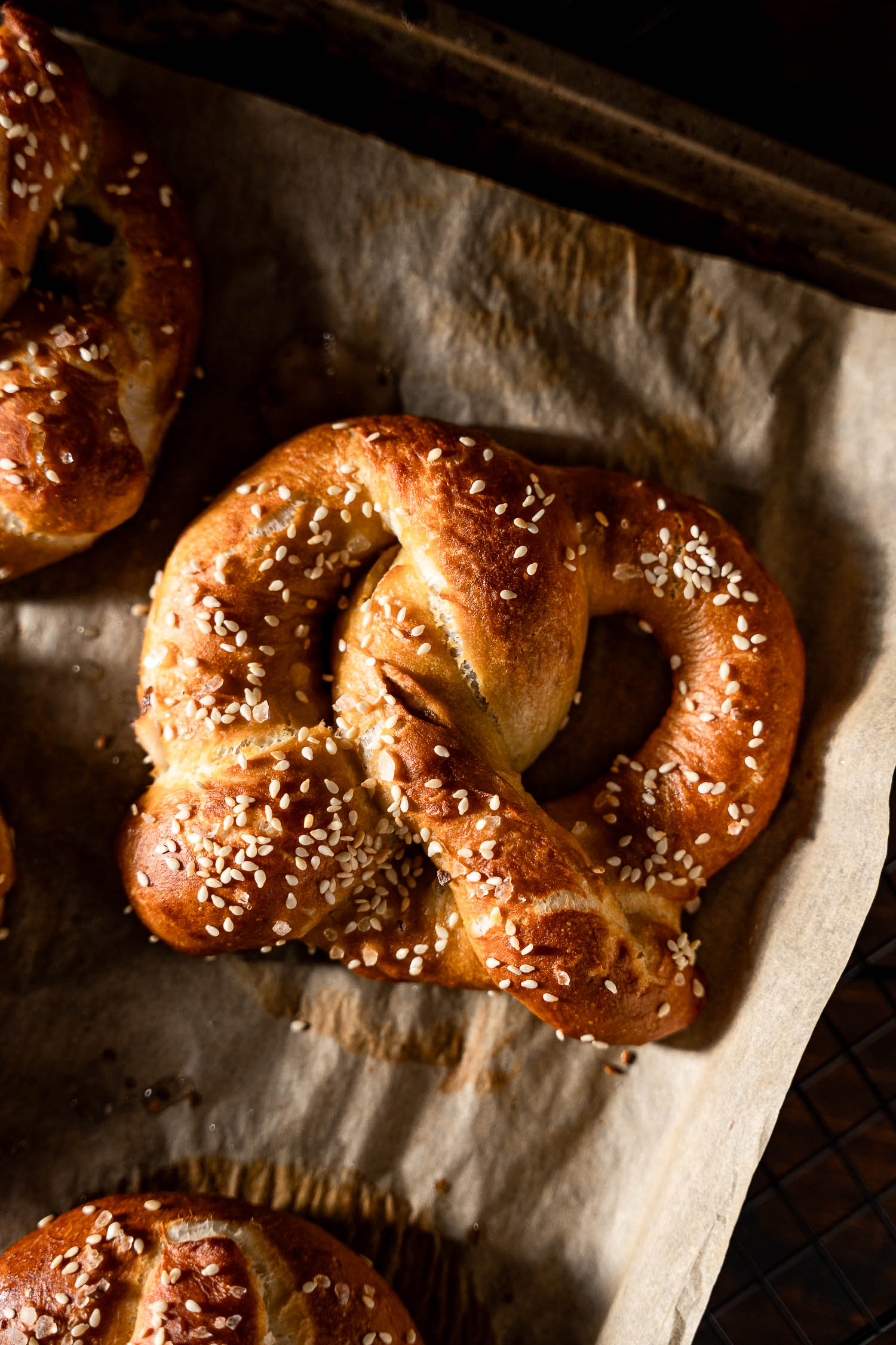 Overhead of sesame covered Vegan Caramelized Shallots and Feta Stuffed Pretzels