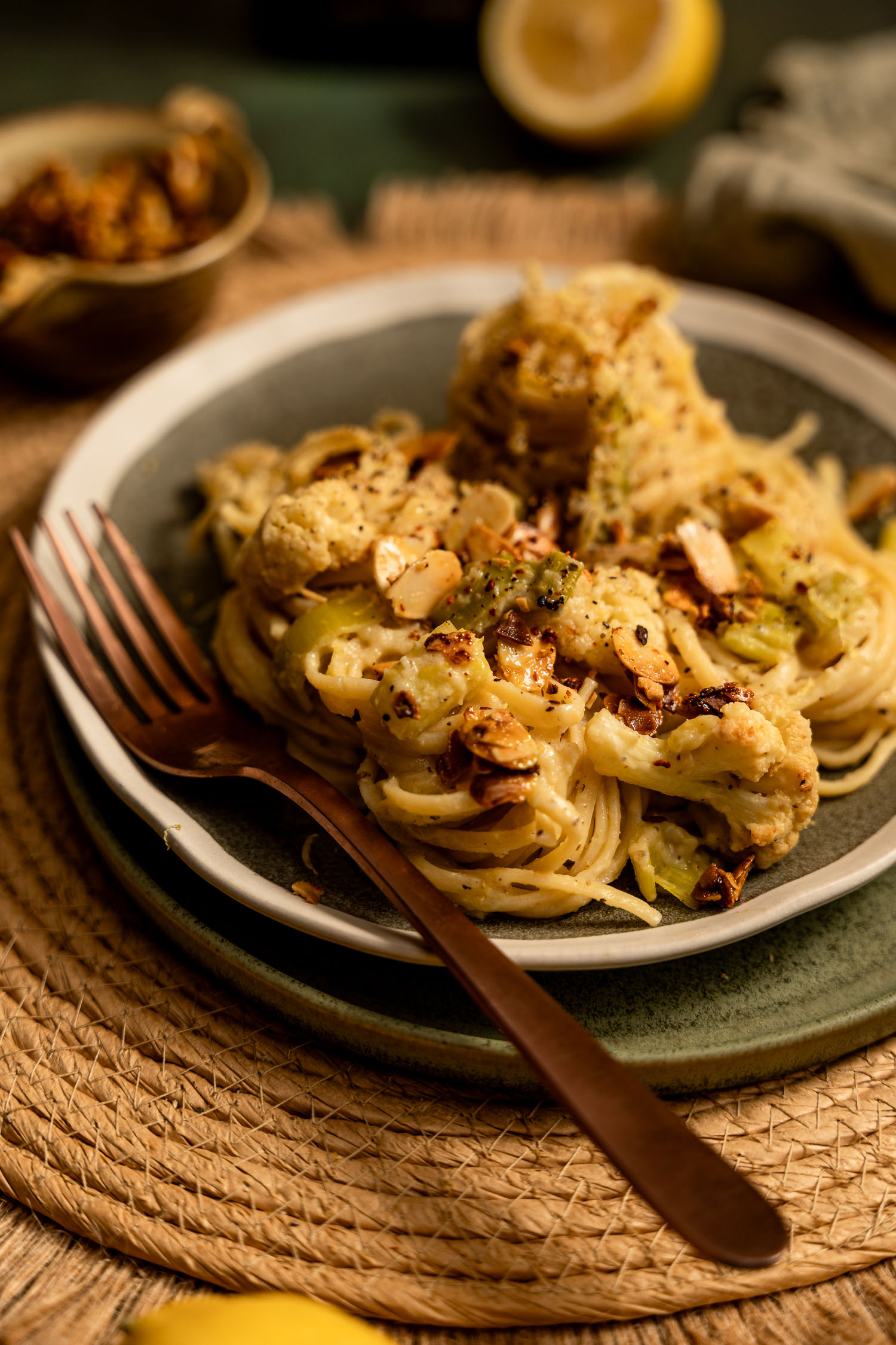 Green plate with Creamy Leek and Cauliflower Linguini